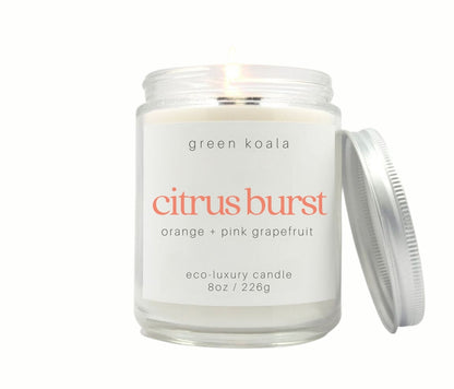 8oz Citrus Burst scented non-toxic handmade candle in a glass jar with silver lid.