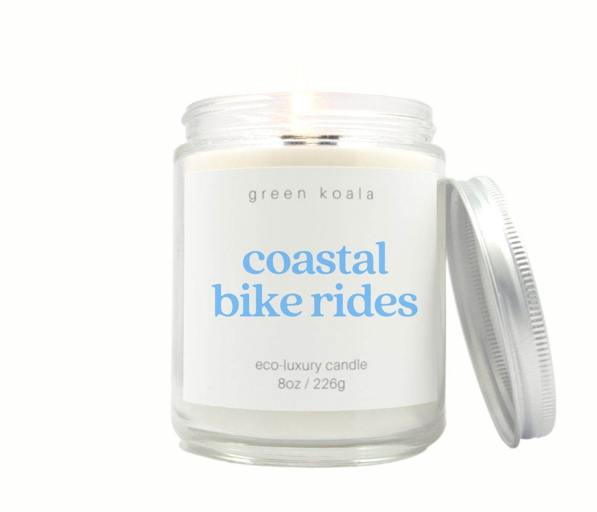 Coastal Bike Rides 8oz Candle with side lid, showcasing a refreshing coastal theme, perfect for creating a calming atmosphere.