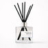 Reed diffuser labeled &