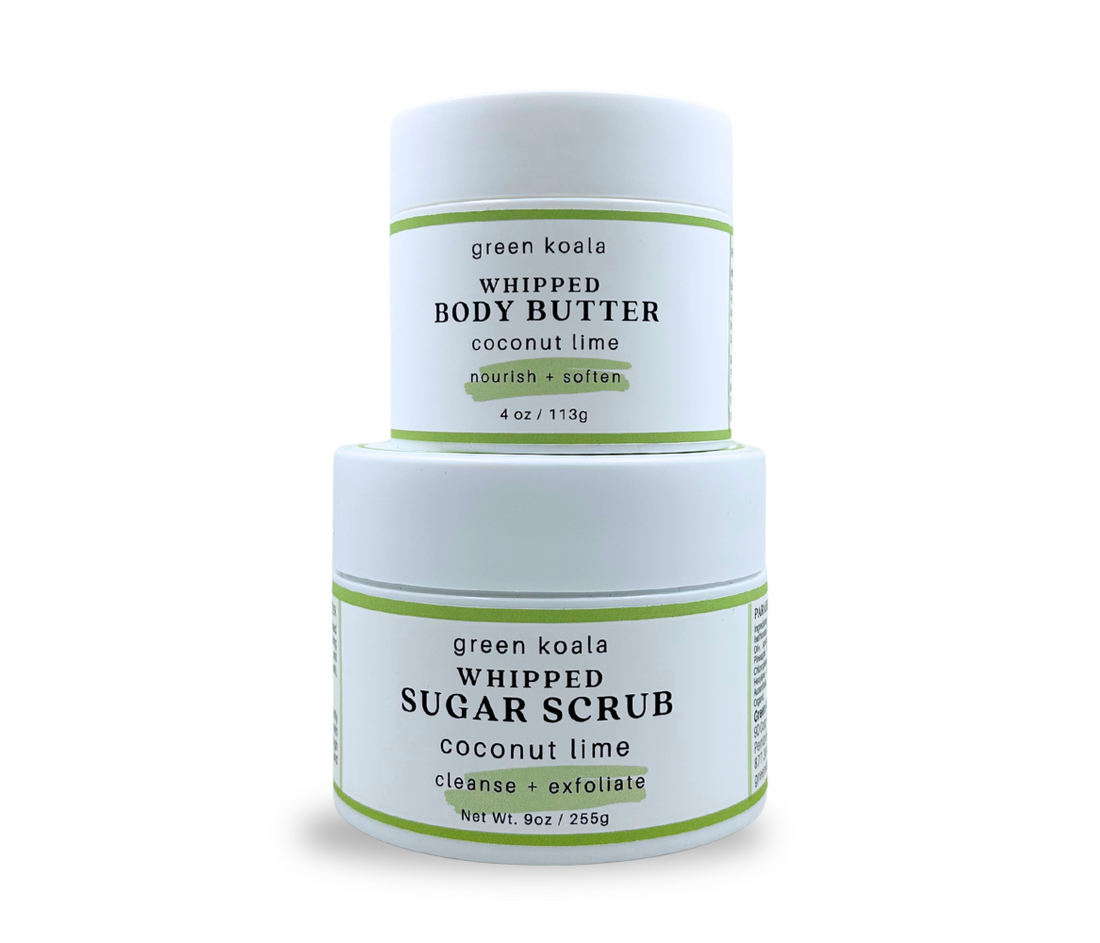 Two jars of green koala coconut lime whipped body butter and sugar scrub on a white background