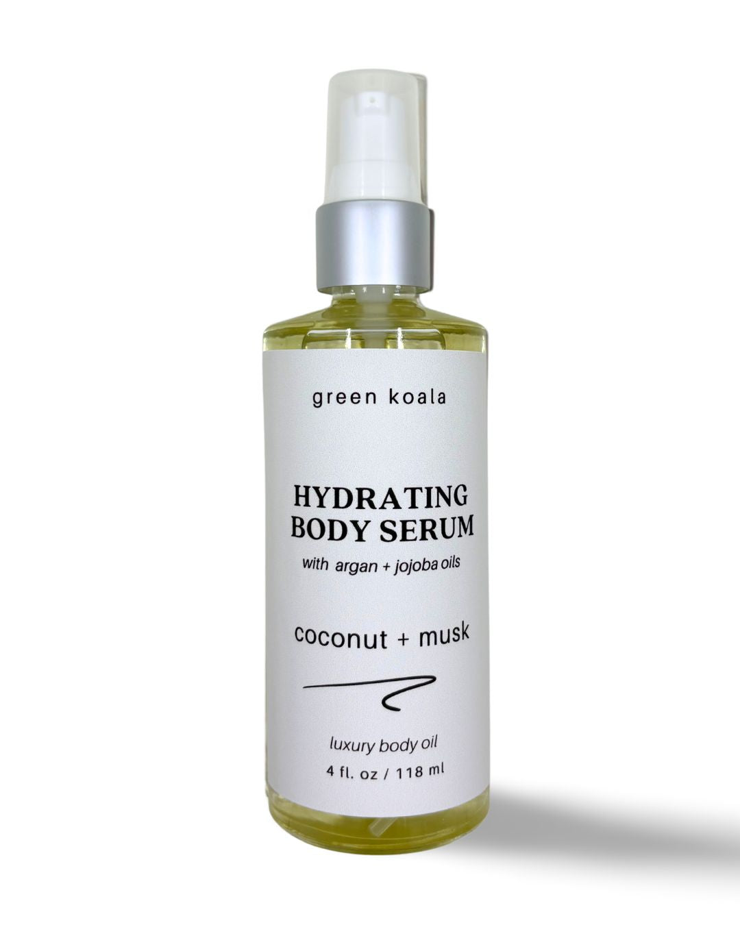 A 4oz glass bottle with treatment pump of organic hydrating body serum for dry skin in coconut + musk scent.