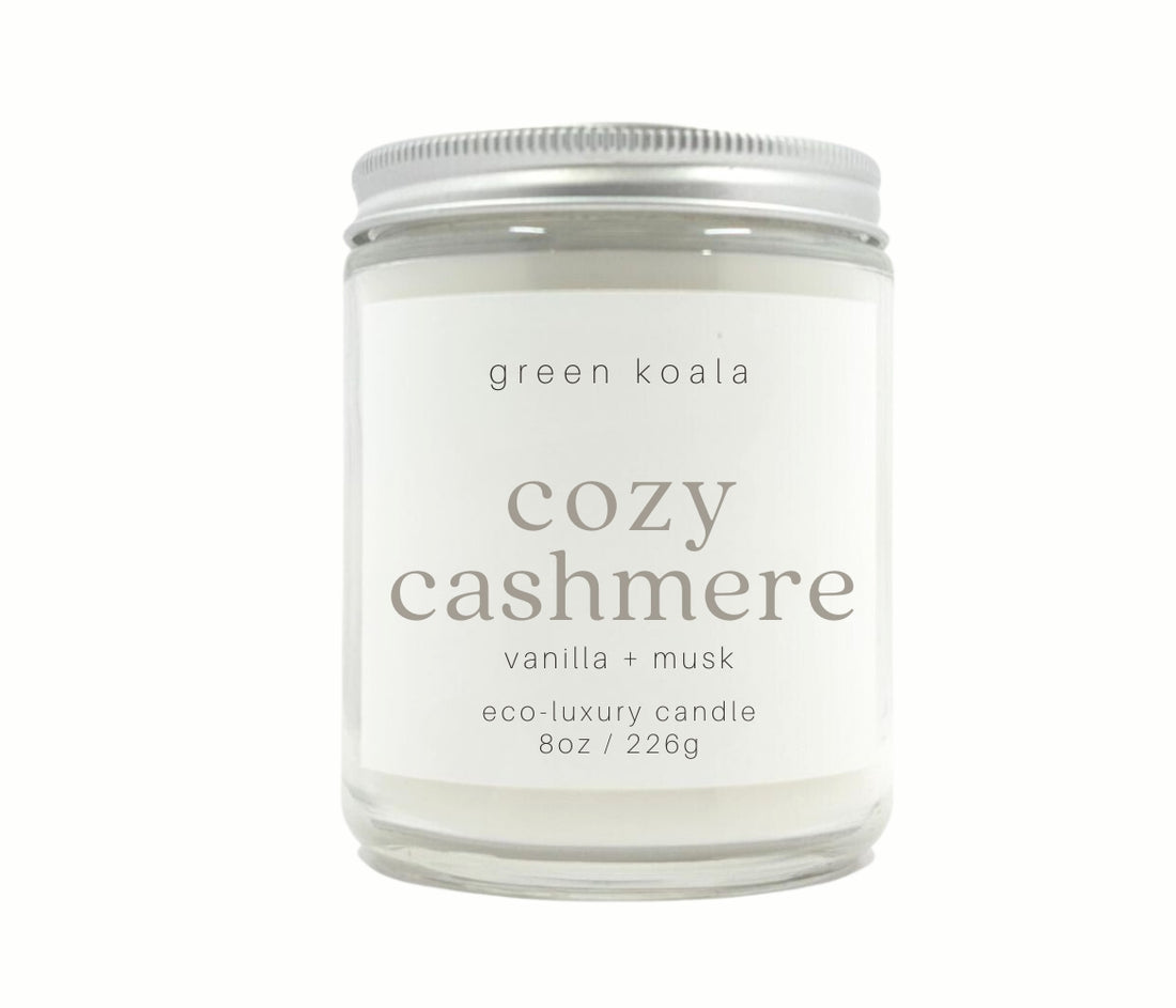 8oz Coastal Calm scented non-toxic hand poured candle in a glass jar with silver lid.