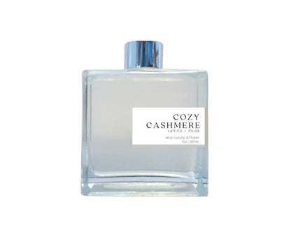 7oz Cozy Cashmere non-toxic scented reed diffuser in glass jar.