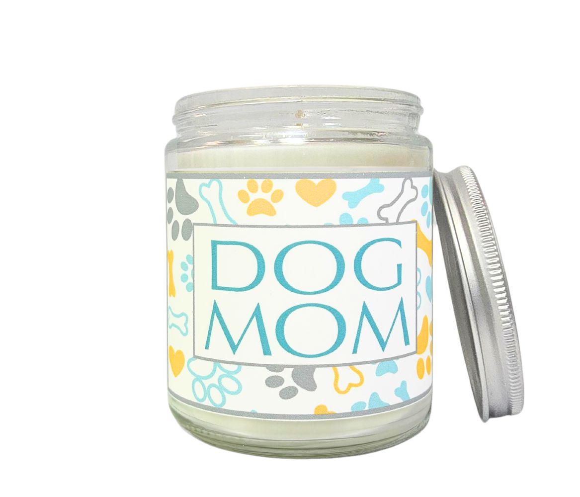 8oz Dog Mom eco-luxury candle with silver lid and decorative label in reusable glass jar. 
