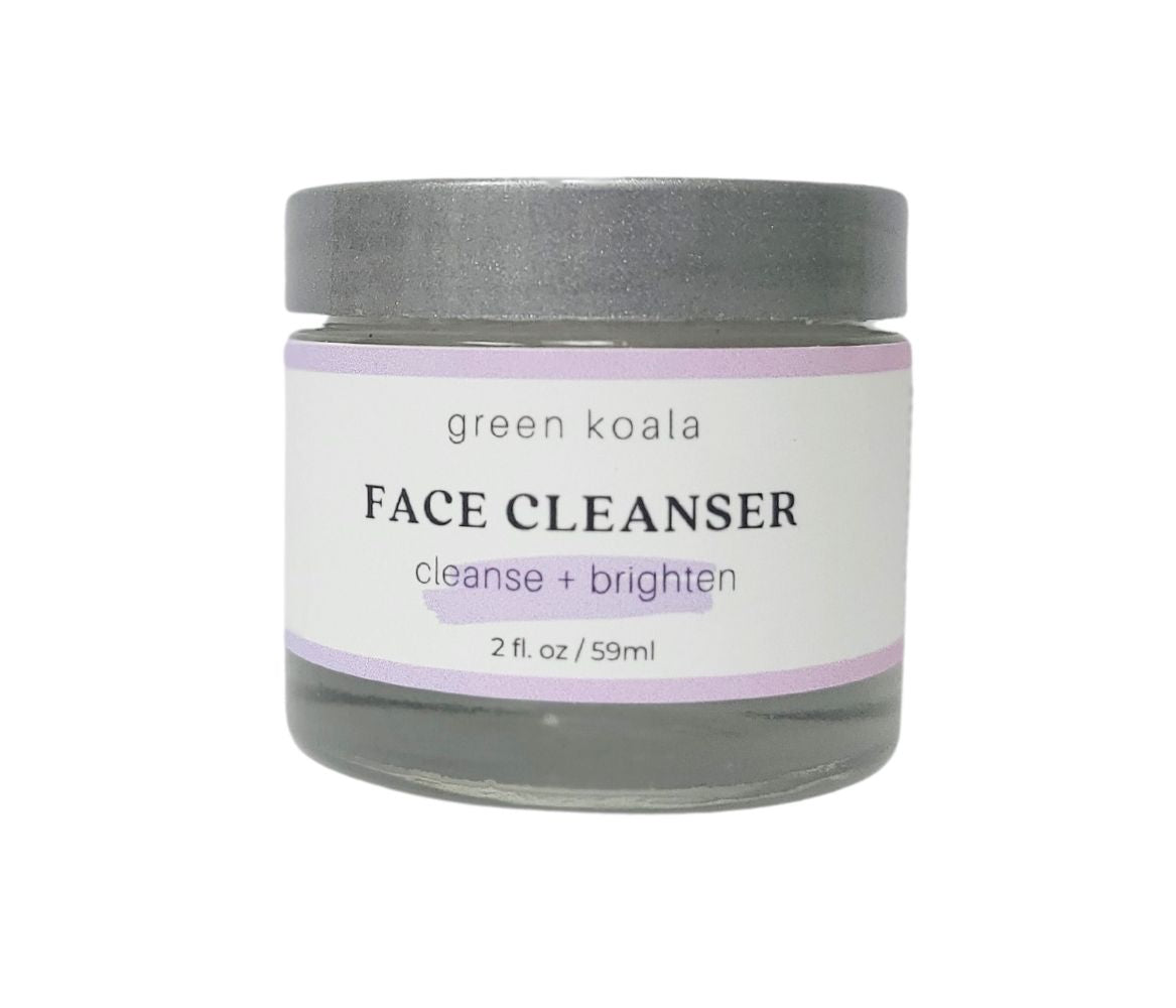 Botanic face cleanser in 2 oz glass jar with silver lid.