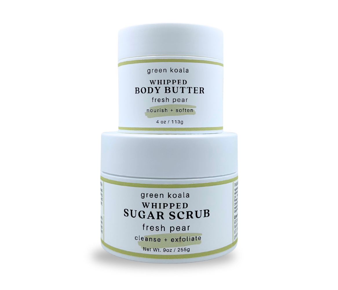 Nourishing gift set of green koala fresh pear whipped body butter and sugar scrub on a white background