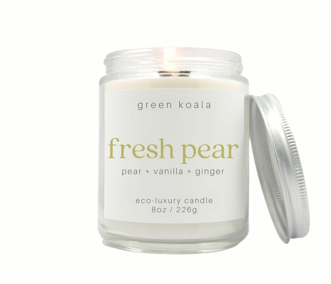 8oz Fresh Pear scented non-toxic and clean burning candle in a glass jar with silver lid. 