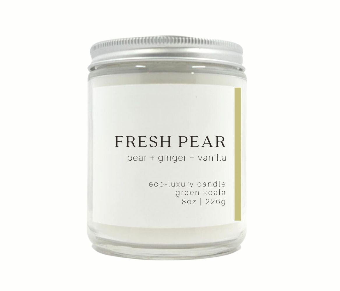 8oz Fresh pear scented candle in a glass jar and silver lid. Made with coconut creme wax and non-toxic fragrance oil.