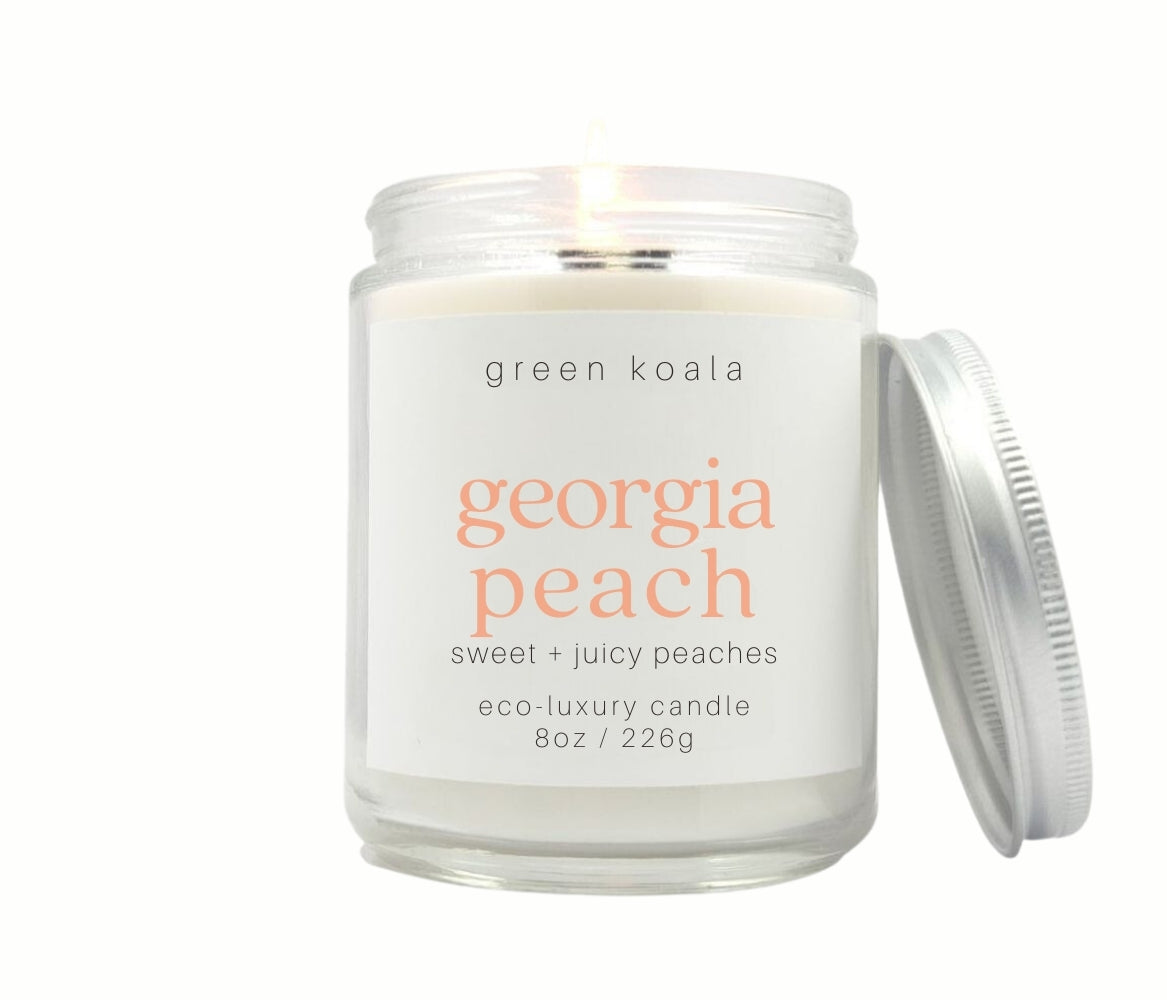 8oz Georgia Peach scented non-toxic and clean burning candle in a glass jar. Smells like fresh picked peaches. 