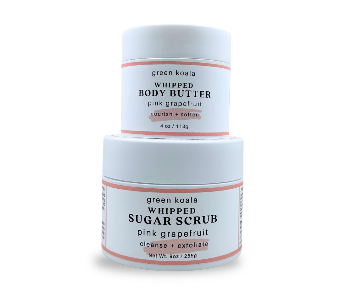 Gift set of green koala pink grapefruit whipped body butter and sugar scrub on a white background