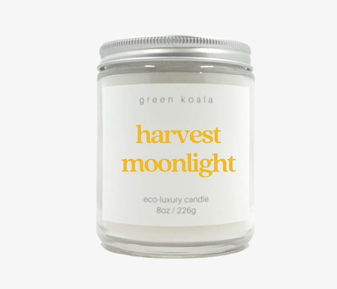 Green Koala Harvest Moonlight 8 oz. candle with lid on