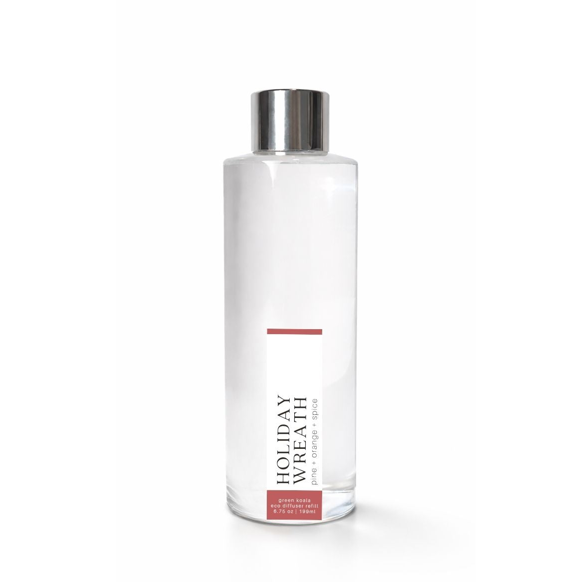 Clear bottle with silver cap labeled Holiday Wreath on a white background
