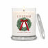 Green Koala personalized holiday wreath 12oz candle with cranberry bow and custom town name label, lit, with glass lid on a white background