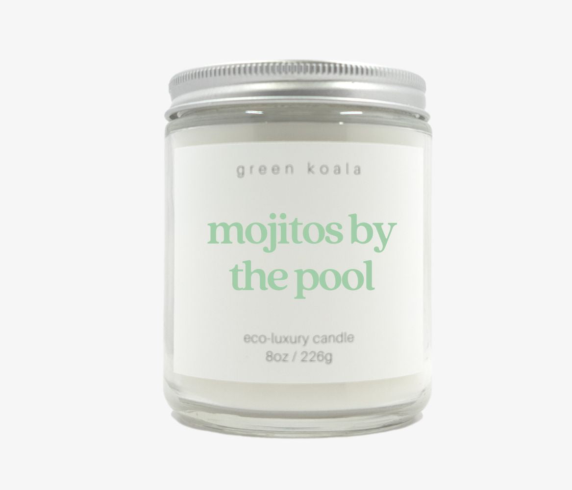 Mojitos by the pool scented candle in an 8oz glass jar with top silver lid. Made with coconut wax.