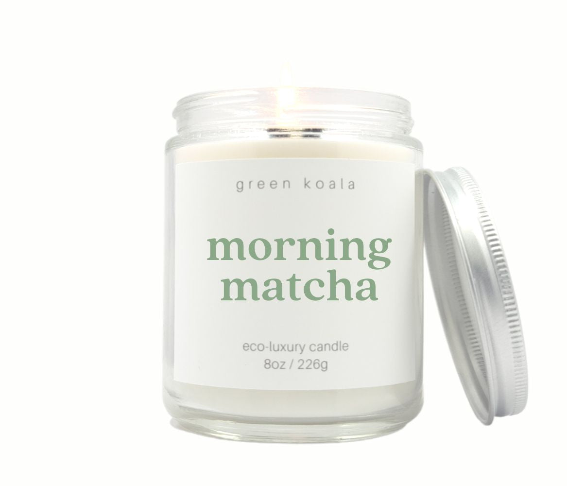 An 8oz Green Koala aromatic candle in a glass jar with a calming matcha scent, perfect for creating a cozy, serene atmosphere.