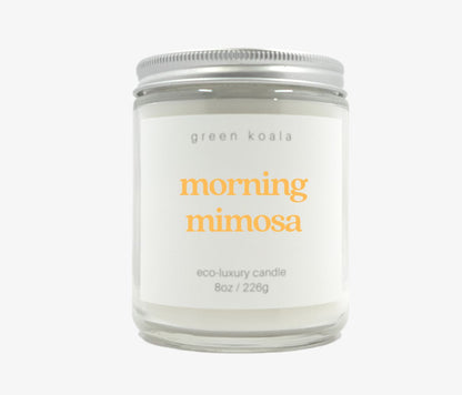 Morning mimosa candle in an 8oz jar with silver lid