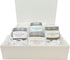 A gift box Face Care Gift Set in a box includes moisturizer, cleanser, hyaluronic acid gel and clay mask.