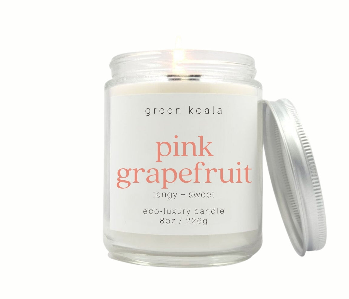8oz Pink Grapefruit scented eco-friendly candle with silver lid. Non-toxic and cleaning burning. 