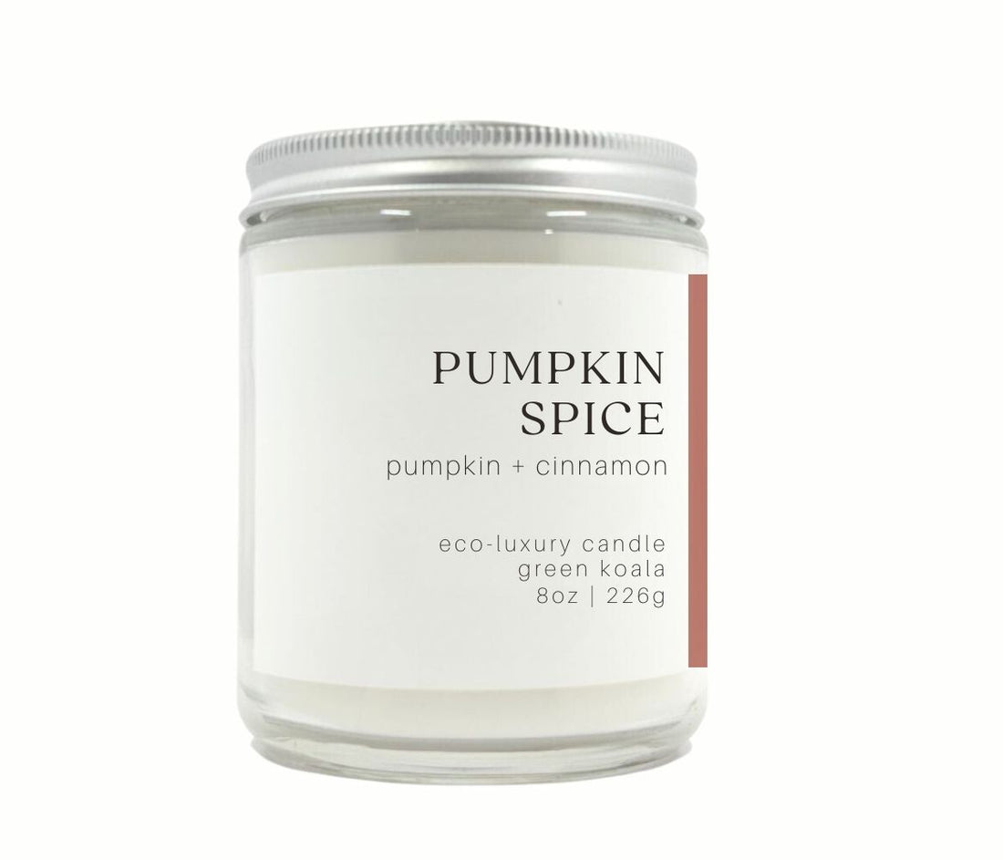 8oz Pumpkin Spice Candle made with coconut wax. in a glass jar with silver lid. 