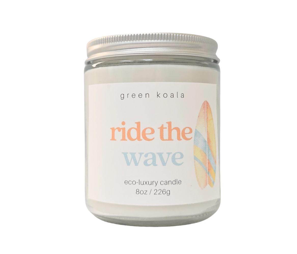 Ride the Wave candle with lid on, top view showing clean, natural coconut wax inside a clear glass jar.