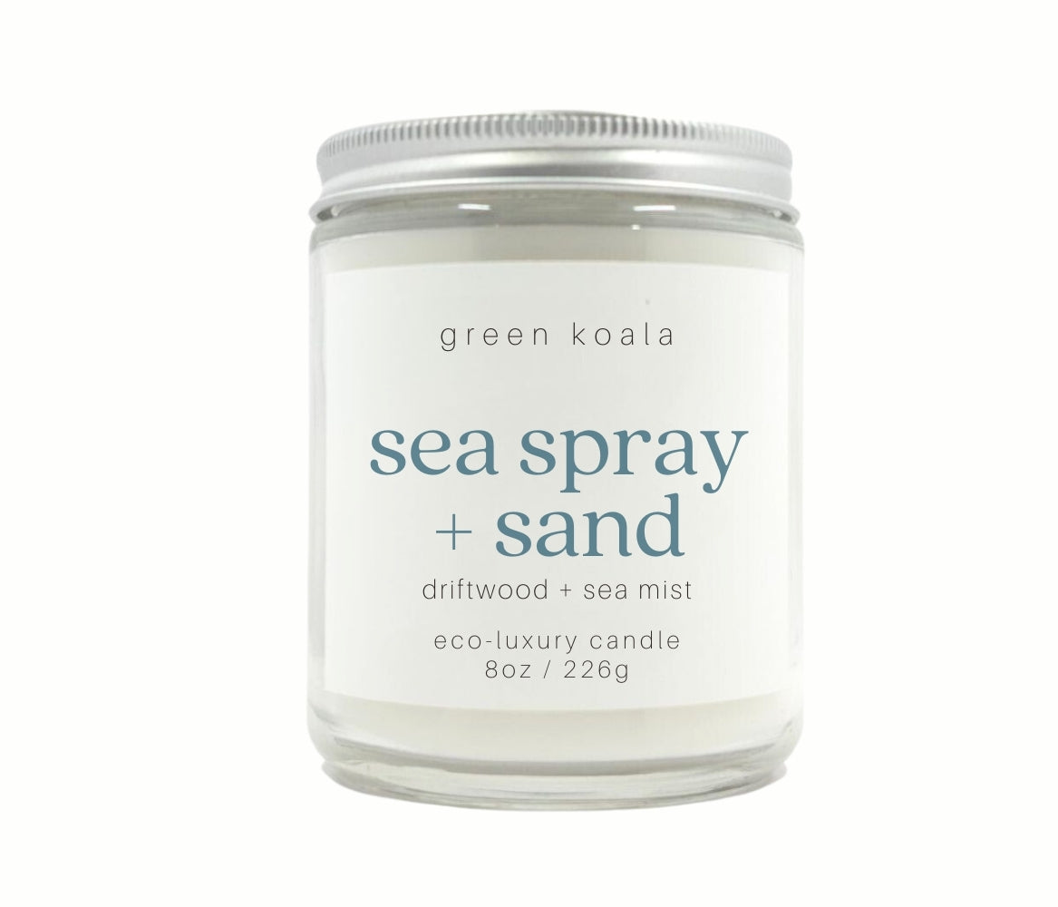 8oz Sea Spray &amp; Sand scented eco-friendly candle in a glass Jar with silver lid for a clean burn. 
