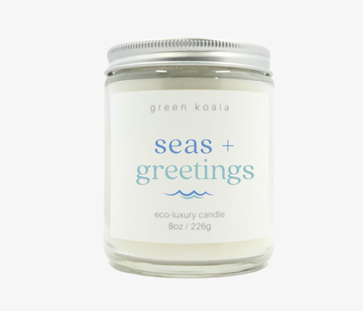 8oz Seas + Greetings Eco-Luxury Candle in an ocean scent in glass jar with cap. Better than soy! Made with coconut wax. 