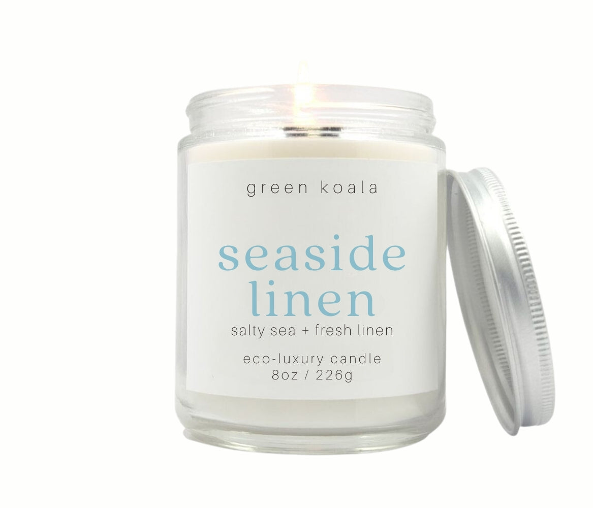 8oz Seaside Linen scented eco-friendly candle in a glass Jar with silver lid for a clean burn. 
