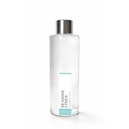 Clear bottle with silver cap labeled &
