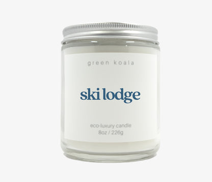 Green Koala Ski Lodge 8 oz. candle with lid on
