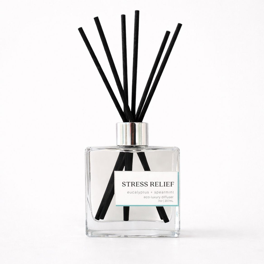 Reed diffuser bottle labeled &