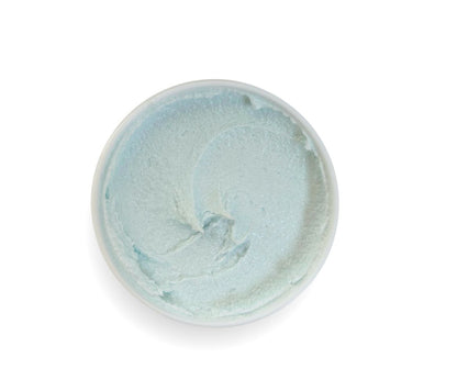 Top-down view of 9oz Stress Relief Body Scrub jar showcasing whipped texture and soothing herbal-minty aroma, cleanses, exfoliates, and deeply hydrates skin.