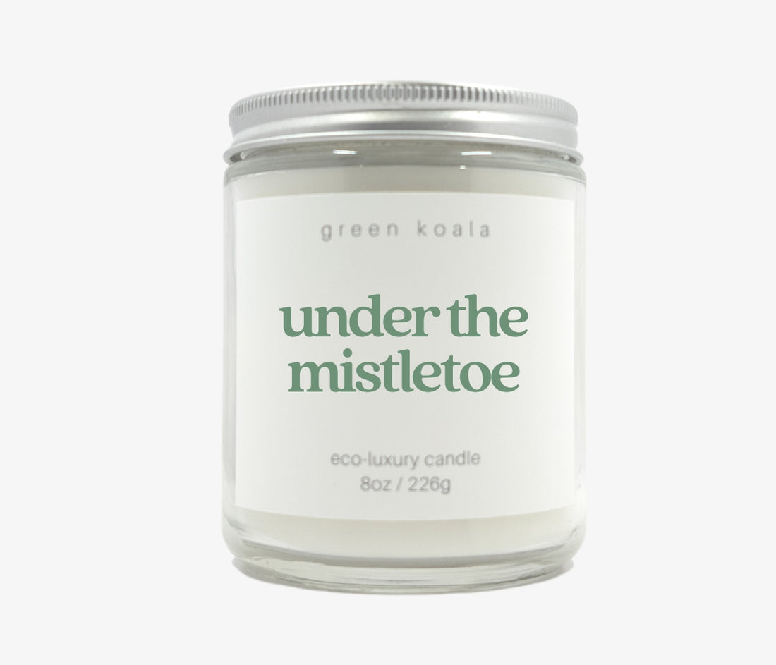 Green Koala Under the Mistletoe 8 oz. candle with lid on