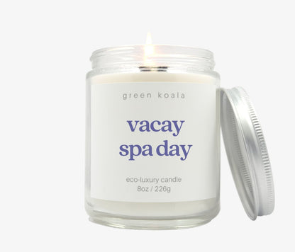 Vacay Spa Day 8oz coconut wax candle with silver lid scented with eucalyptus and spearmint.