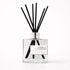 Vanilla Lavender diffuser with black reeds on a white background