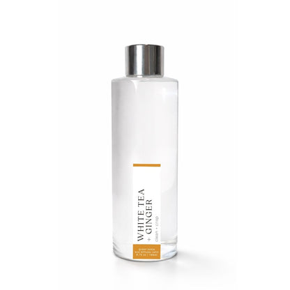 Clear bottle with silver cap labeled &